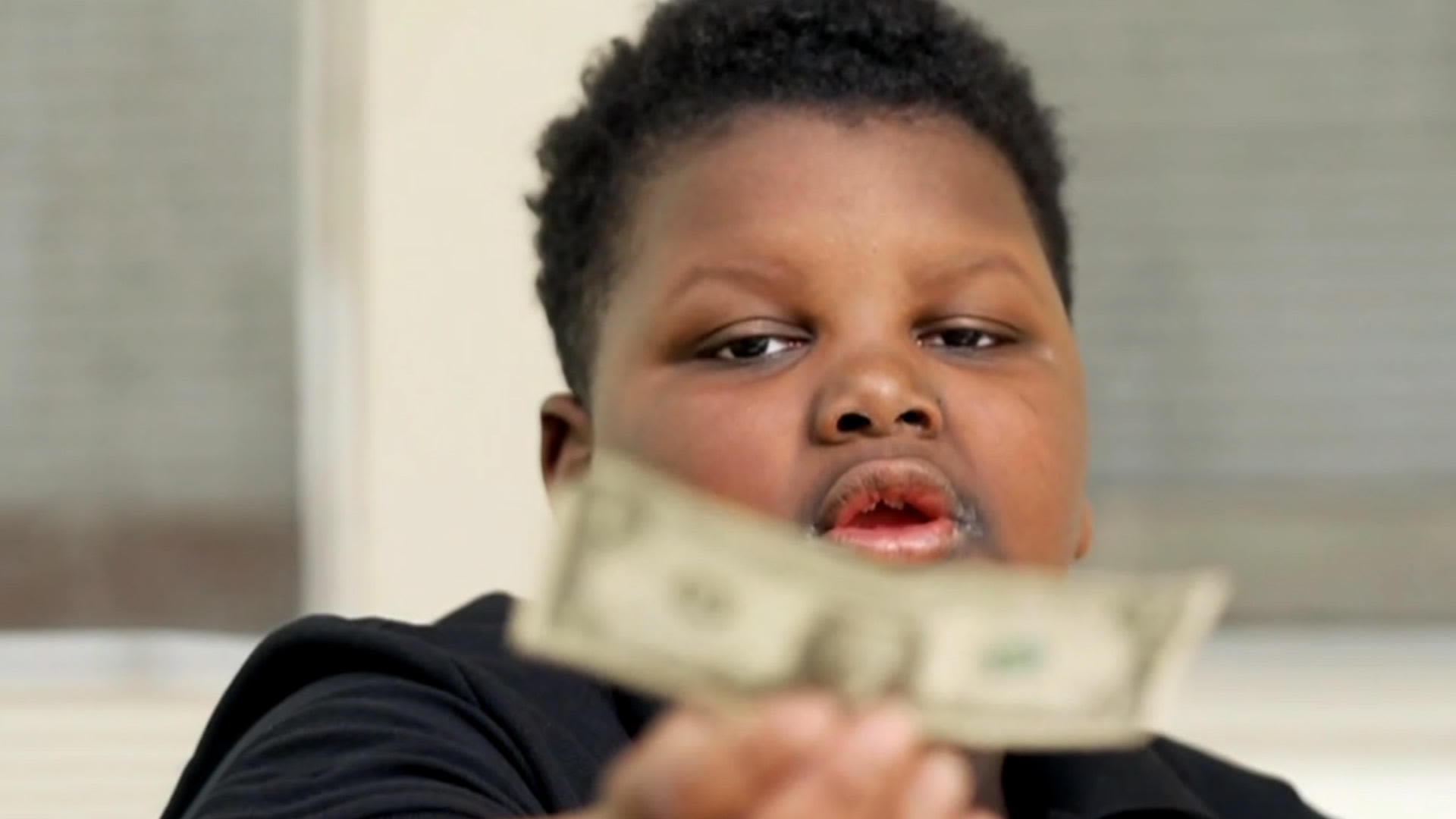 A boy gave away his only dollar. In exchange, he was rewarded for his generosity.