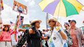 Jimmy Buffett was honored at the New Orleans Jazz Fest as Queen Latifah put 'Ladies First'