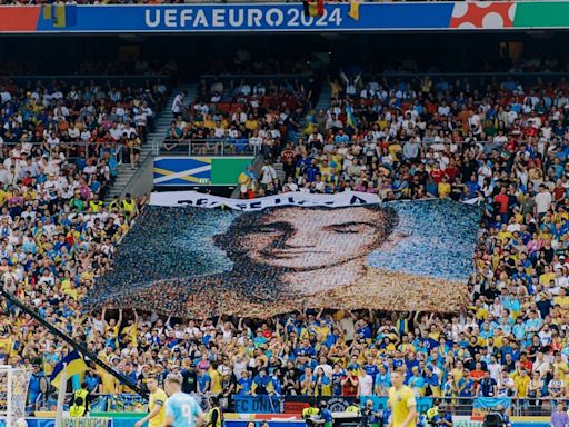 'Peace has a price': Football fans display mosaic of fallen Ukrainian soldiers at Euro 2024 match