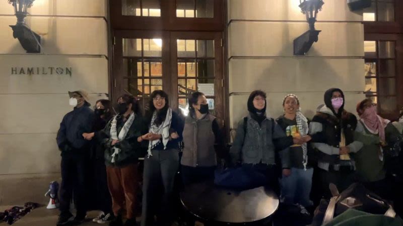 See what Columbia students are doing to prevent cops from entering occupied building | CNN