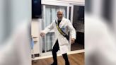 Doctor turns heads by 'rolling' his way into retirement