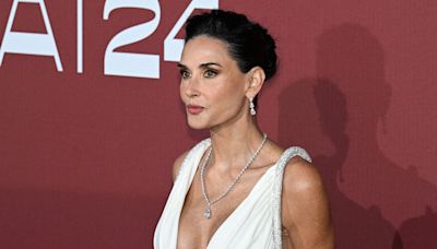 Demi Moore Channels Greek Goddess Glamour in Plunging Loewe Dress at Cannes AmfAR Gala 2024