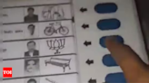 'Wake up now': Congress, Samajwadi Party demands action after viral video shows man voting multiple times | India News - Times of India