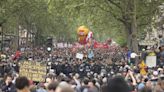 Pro-Palestinian banners. Blazing Olympic rings. Workers’ May Day rallies confront turbulent times