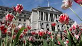 Stocks consolidate record highs, pound ground down by BoE