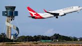 Qantas agrees to pay $79 million in compensation and a fine for selling seats on canceled flights