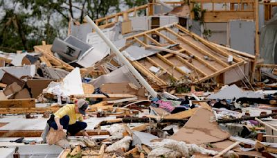 Storm-battered South is again under threat. A boy swept into a drain fights for his life