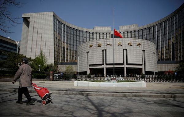 China central bank surprises by lending again at lower rates