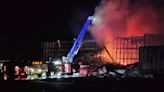 Update: 3+ weeks later flames erupt from still burning, huge warehouse in Finley