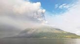 More than 2,100 people are evacuated as an Indonesian volcano spews clouds of ash