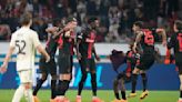 Leverkusen rallies late in draw with Roma to preserve unbeaten record and reach Europa League final