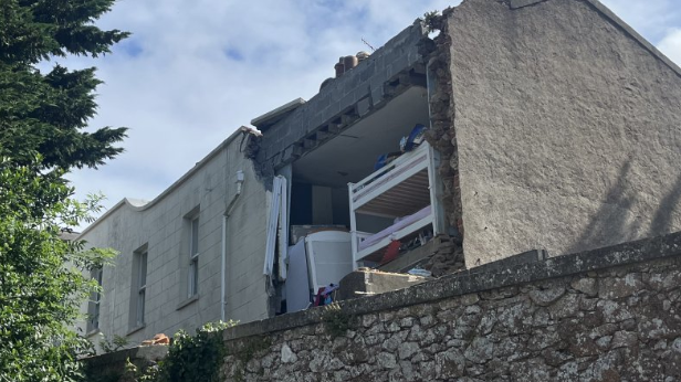 Four in hospital after house partially collapses