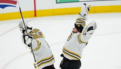 Marchand breaks team playoff goals mark, Bruins beat Maple Leafs 3-1 to move within win of advancing