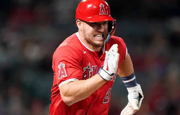 Angels star outfielder Mike Trout has knee surgery. Team expects 3-time MVP to return this season.