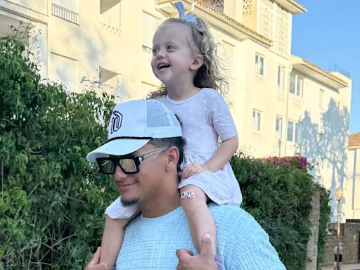 Patrick Mahomes Gives Daughter Sterling a Piggyback Ride in Sweet Photos: ‘Girl Loves Her Daddy’