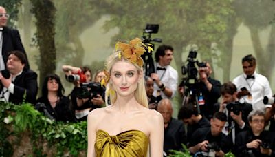 The Crown's Elizabeth Debicki Gleamed in Gold on the Met Gala Red Carpet