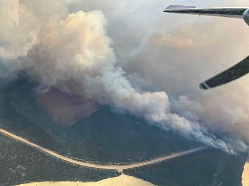 Wildfires across western U.S. and Canada force thousands to evacuate