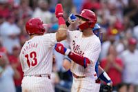 Turner hits grand slam, Wheeler exits with back stiffness in Phillies 10-1 win over Dodgers