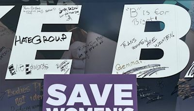 Tour bus vandalized in NC town with messages supporting trans people, athletes