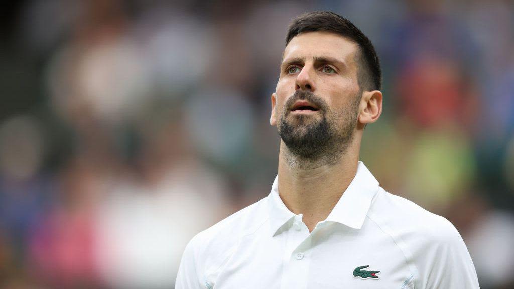 Djokovic into Wimbledon semis after De Minaur withdraws