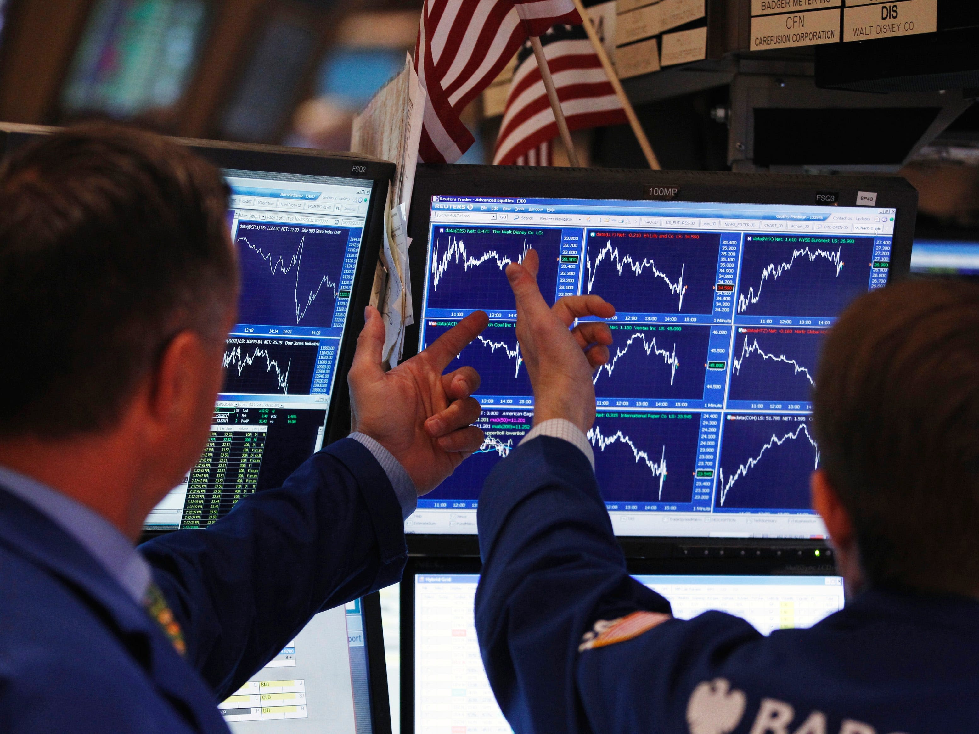 Stock market today: Nasdaq hits record, Dow tumbles as bond yields spike