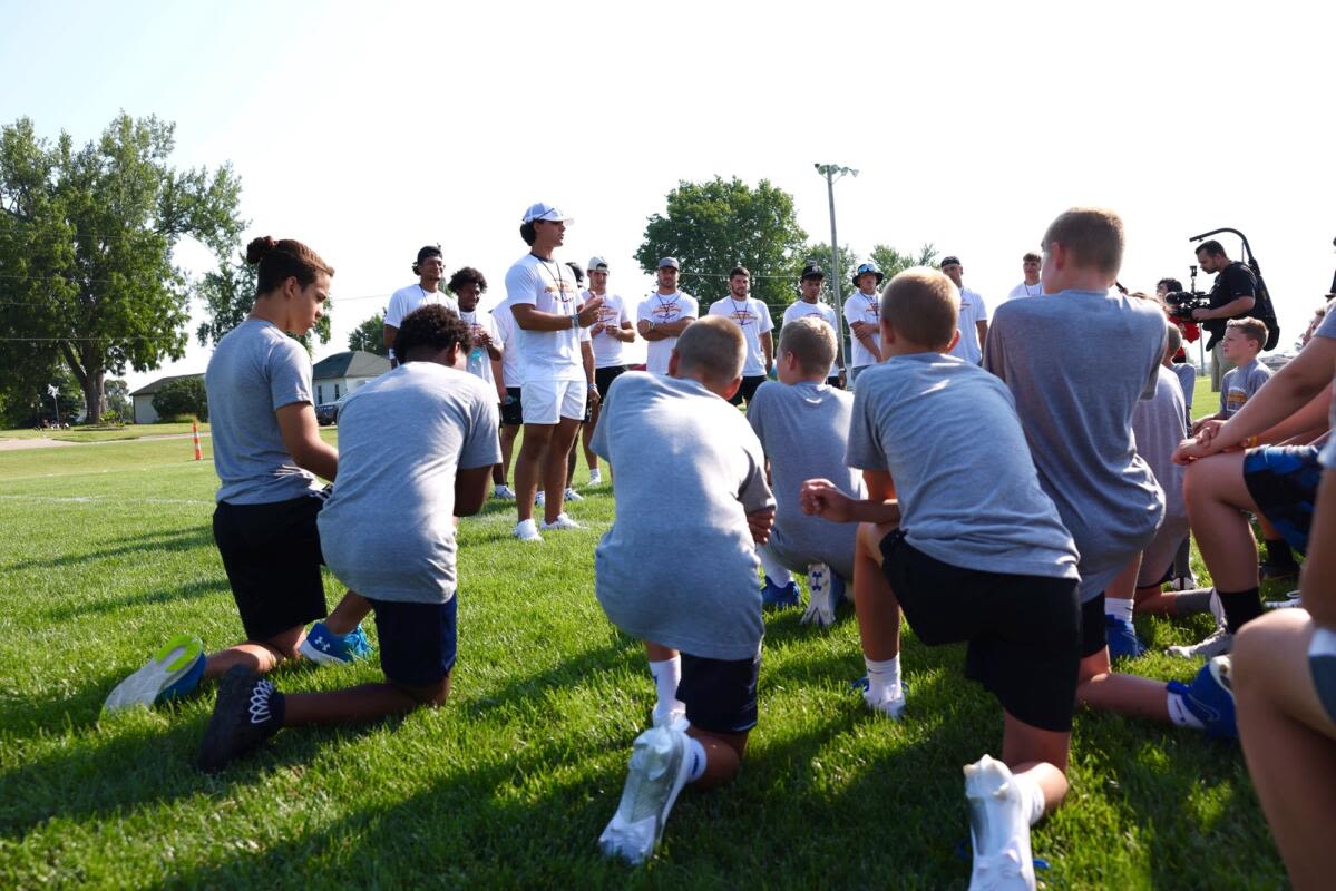 Iowa State QB Rocco Becht's camp in Perry brought smiles, as intended