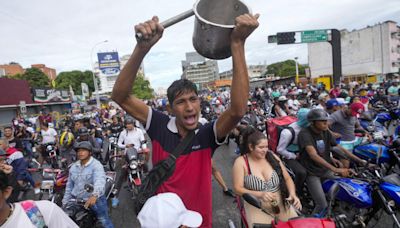 Opposition says it has proof Maduro challenger won as Venezuela braces for more unrest
