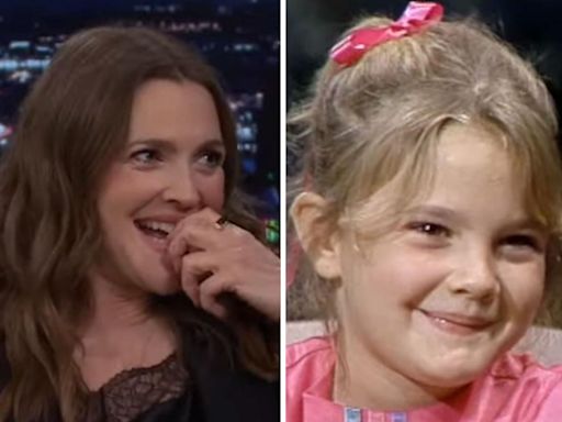 Jimmy Fallon surprises Drew Barrymore with a clip from her first 'Tonight Show' appearance in 1982: "My legs don't touch the ground"