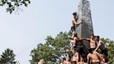 U.S. Naval Academy plebes to cap their first year with greasy, grueling Herndon Climb