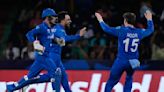 Afghanistan stuns Australia to keep Twenty20 World Cup dream alive. India beat Bangladesh