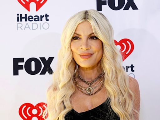 Tori Spelling shares the story of her first breast augmentation: ‘I can’t make this up’