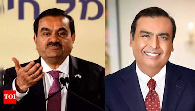 At Rs 9 crore, Adani pay in FY24 lags peers - Times of India