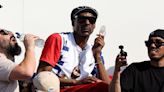 Snoop Dogg Wears Custom T-Shirts Featuring Olympians Simone Biles And Coco Gauff Amid Paris Olympics 2024 Appearance