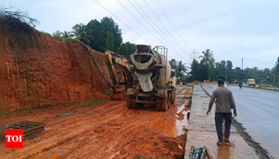 NHAI yields to villagers' demands at Sanoor; starts building a retaining wall for the dangerous hillock | Bengaluru News - Times of India