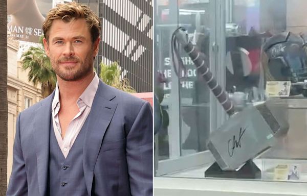 Chris Hemsworth Comes Face-to-Face with Thor's Hammer at Universal Studios: 'I Don't Remember Signing That'