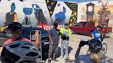 Team of local artists painting mural in Downtown Las Vegas in celebration of Aces back-to-back championship win