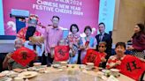 Central Singapore CDC, Si Chuan Dou Bring CNY Cheer to Residents With Calligraphy, Feast