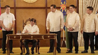 Marcos signs New Government Procurement Act, anti-scam law