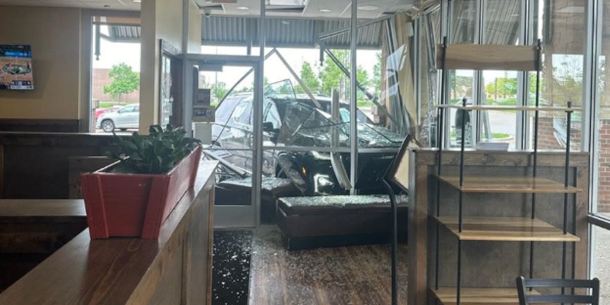 No injuries after car crashes through front of Big Biscuit in Overland Park