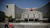 China central bank surprises by lending again at lower rates
