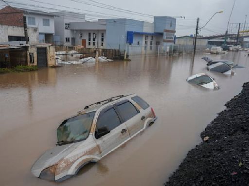 Brazil's flooded south sees first death from disease, as experts warn of coming surge in fatalities