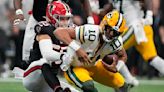 Love takes blame for crucial botched quarterback sneak in Packers' 25-24 loss to Falcons