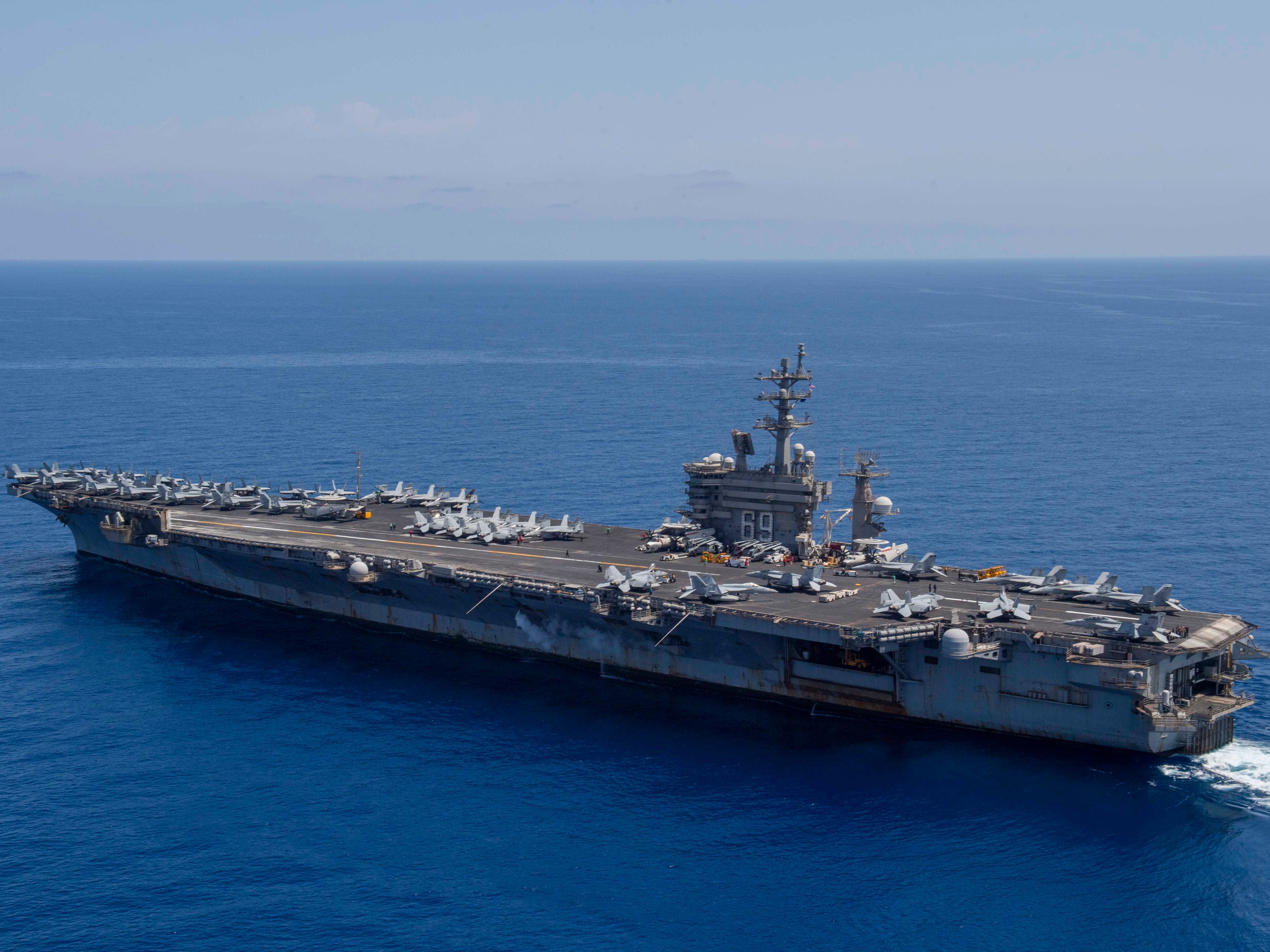 A US Navy aircraft carrier is rearmed and back in the Red Sea amid a Houthi missile crisis with no end in sight