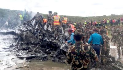 Pilot is sole survivor after plane carrying 19 people crashes in Nepal shortly after takeoff