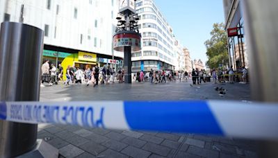 Security guard disarms attacker after girl and woman stabbed in central London