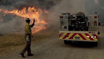 Wildfires plague the West amid a scorching heat wave and high winds