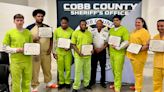 11 offenders complete GED program at Cobb County Detention Center