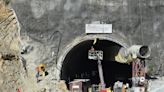 India tunnel rescue efforts stopped briefly over fears of further collapse