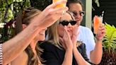 Pregnant Margot Robbie treats fans to a round of drinks at The Ivy