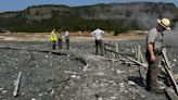 Surprise blast of rock, water and steam sends dozens running for safety in Yellowstone